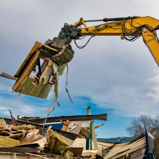 Fast-response demolition of unsafe structure with excavator – emergency demolition services in Southern Rhode Island