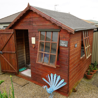 Small shed on residential property – outbuilding demolition services in Rhode Island for sheds, barns, and garages